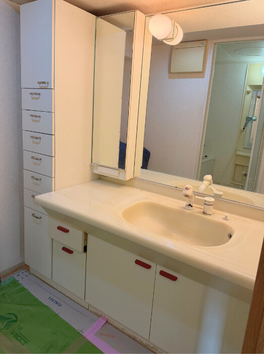 明石市のマンションで洗面台のリフォーム　広いスライド収納で使いやすくなりました　